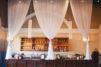 Chiffon Drapery Bar Treatment with Square Bead Chandeliers