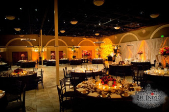 30 Candle Iron Chandeliers, Ivory Taffeta Drapery, and GOBO Washes