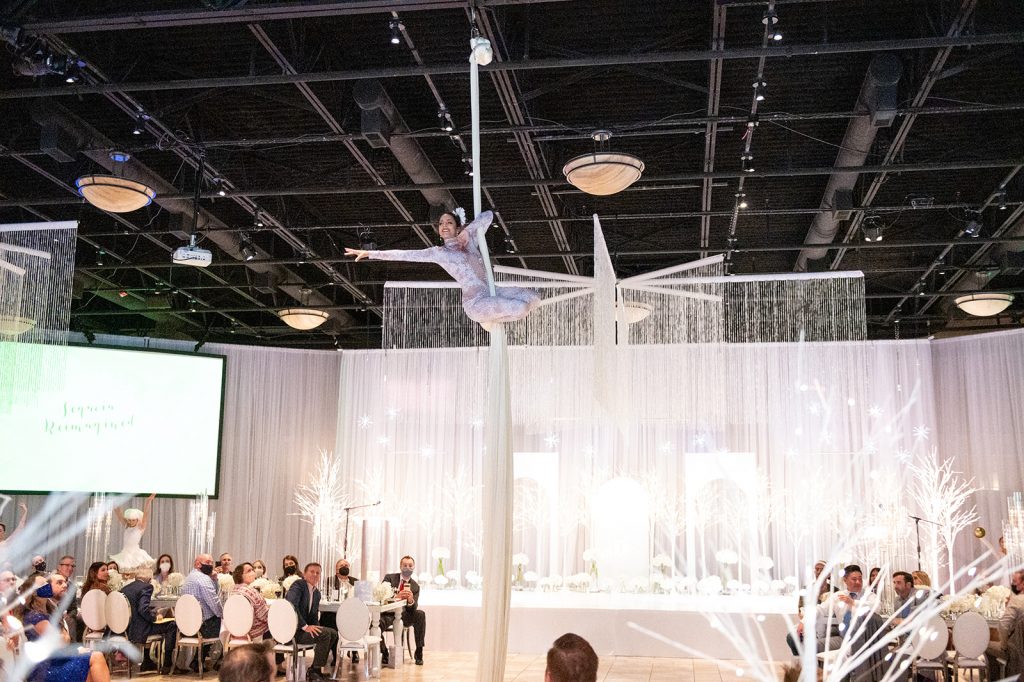 Nina Sawant - aerial dancer at Casa Real holiday party | Livermore CA event lighting design