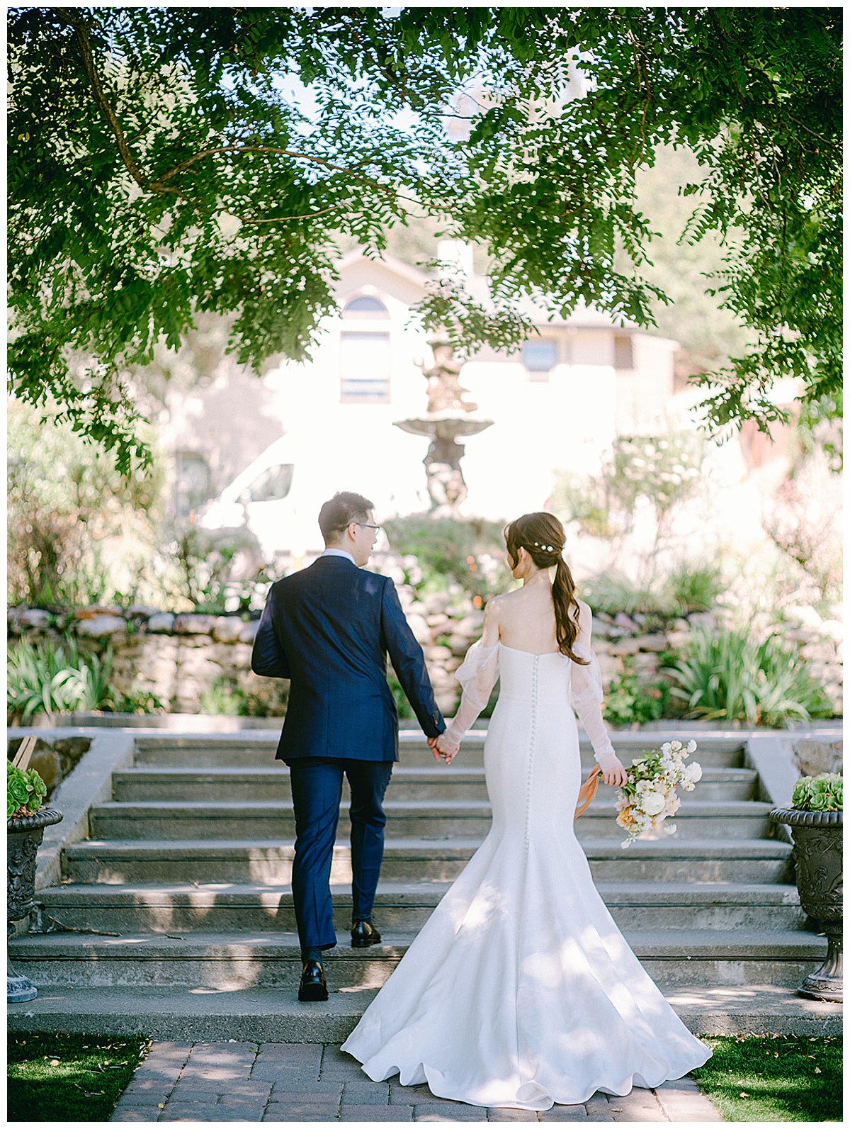 bride and groom portrait on stairs 