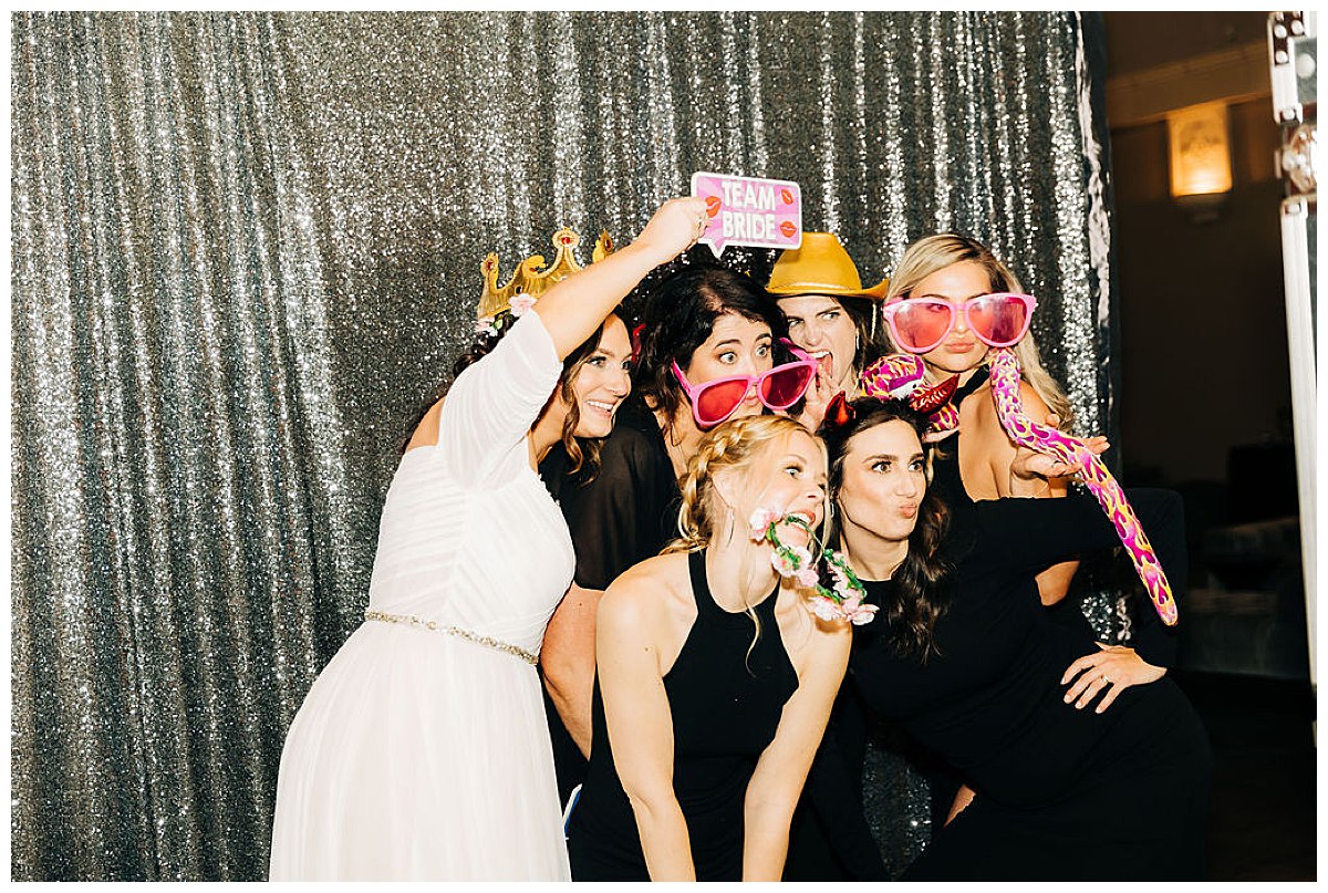 Bride and bridesmaids in the photobooth