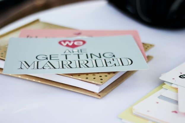 card announcing engagement