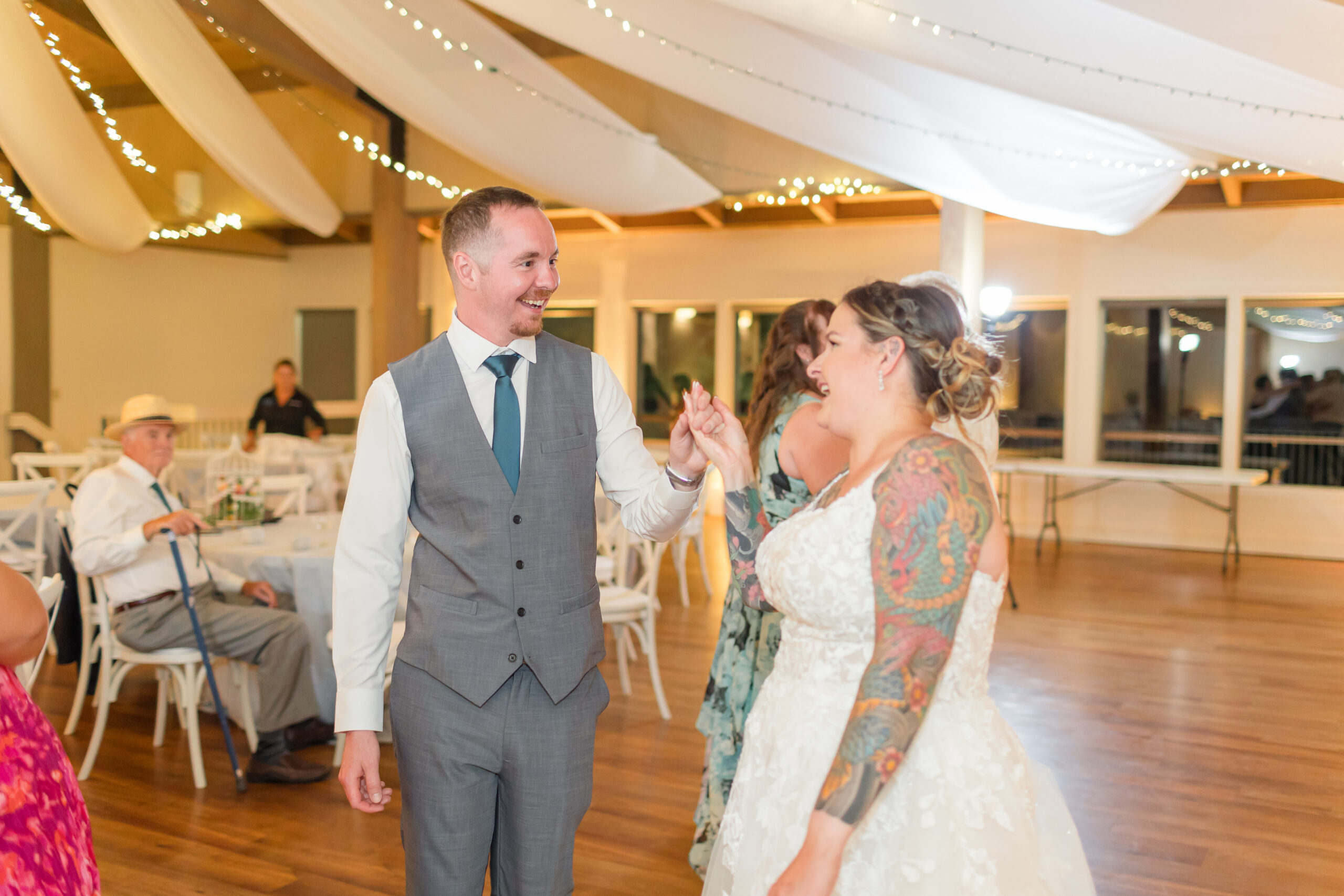 bride and groom dancing