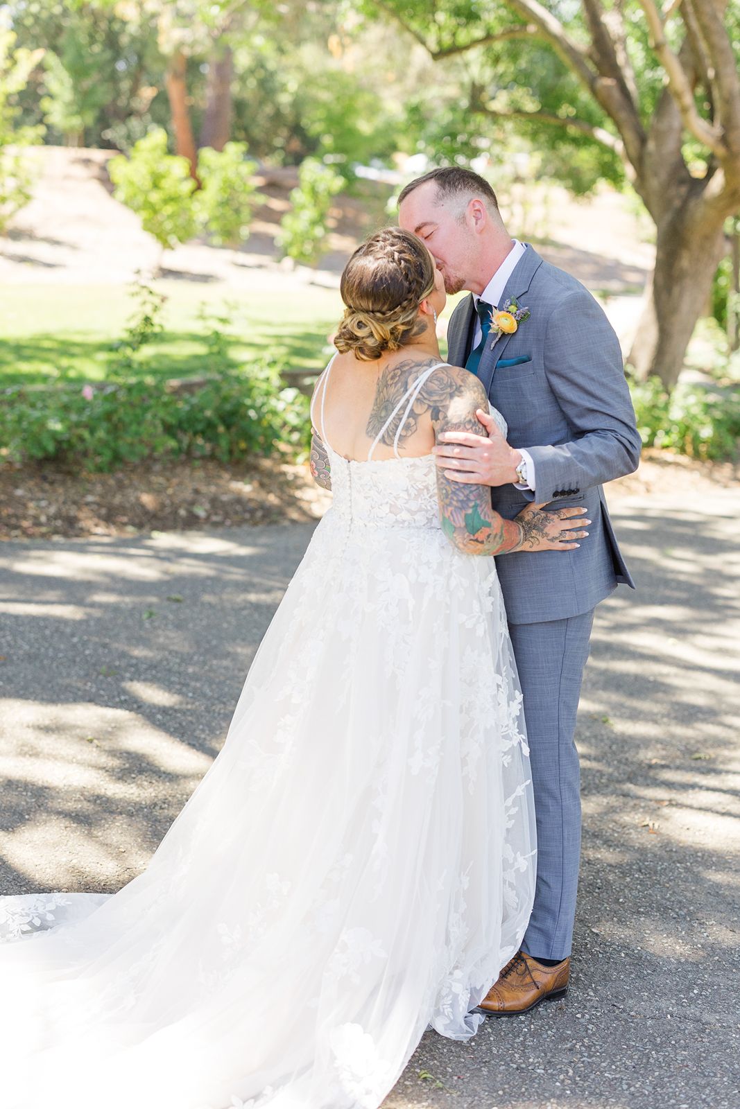 bride and groom kiss