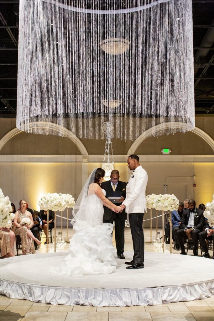 hanging chandelier over wedding ceremony