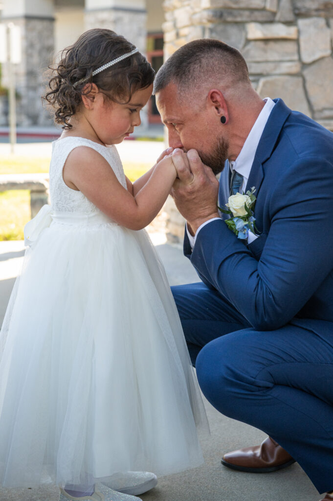 groom and flower girl 